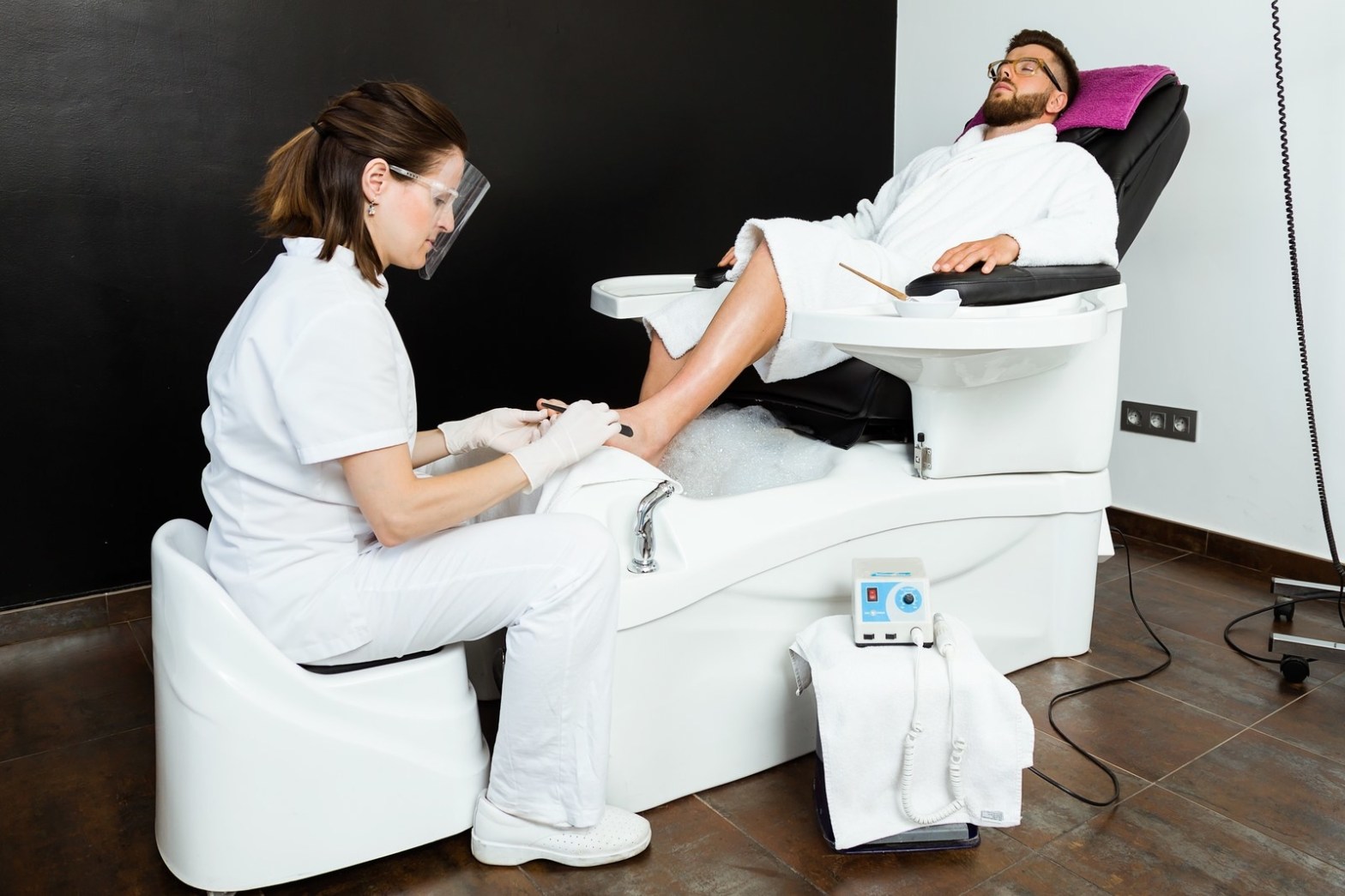 After a spring that seemed never to end, summer officially came. That means it's time to give up ballerinas, shoes, and sneakers and take the sandals out of the boxes. Therefore, our pedicure must look impeccable. It is unnecessary to go to the beauty salon to have a flawless pedicure; we can do this alone, at home, as long as we know some essential tricks that guarantee our success. It is not enough to have trendy nail polish for a perfect pedicure. Still, it would help if you also had a suitable file, a pair of scissors, a toe separator, a nail polish base, a topcoat, and essential oil with whatever aroma you want. How to make your perfect pedicure, step by step Clean nail polish - in the first phase, nail polish should be removed with plenty of acetone and cleansing disks or cotton wool. Soak your feet in the water - fill a basin with warm water, in which you will put a little bath foam and essential oil with your favorite aroma. Take advantage of this time to relax. You can put salt and water in this to enjoy its countless properties, but also lemon juice, especially if you have yellowed nails. Your feet - after you have softened your feet, use a mixture prepared from shower gel and cornstarch or coffee to exfoliate dead skin cells. The legs will thus remain velvety. Rinse your feet and wipe them with a very absorbent towel. If you have dehydrated skin on your feet, you can use a DIY scrub prepared from coconut oil and coffee grounds, which will exfoliate and deeply moisturize the skin. Give them a shape - using scissors and a file; you can give a shape to your toenails. Try to cut your nails only straight to avoid problems that may occur due to corners. For cuticles, you can use a particular product that will remove them. If this product does not cope, push the cuticles with the file. Apply the nail polish base - for the nail polish to have an adhesion on the nail and prevent the nail polish's nailing; it is advisable to apply a nail polish base. If you do not have such a product, apply a layer of regular nail polish, which will act as a protective barrier. You can use a toe separator to separate the toes, but if you do not have such a separator, you can also use a rolled kitchen napkin. The advantages of doing your manicure at the salon For a long time, you've been telling yourself that you have to take the time to get your manicure done. You had planned for this weekend, but unfortunately, something else intervened. You aim to succeed in one of the evenings of the week that has begun, but every time urgent household chores appear, and fatigue and the desire to put your head on the pillow take precedence. A safe option is to call the salon and make an appointment for a manicure. Professional services The specialized staff of the salon, the technique, the equipment, the applied products, the hygiene, the finish, and the durability lead to an impeccable manicure. The person who does your manicure wants to offer you moments of pampering and relaxation. She has a lot of ideas and suggestions, she knows what to wear, so you will leave with an original manicure, full of creativity. Reseat A professional salon knows how to offer the client the right atmosphere to relax. Besides the salon's modern design, the ambiance is favorable to relax, the sound background, the scent of the room, and the coffee provided. Also, it is not just a simple application of nail polish; the person in the excellent salon care, including cleansing, moisturizing, massage so that you feel like a queen. Professional products The professional salons offer a wide range of semi-permanent nail polish bottles from which you can choose, all from renowned manufacturers. In addition, a good relationship you have created with the beautician will allow you to ask for advice; you can choose to buy professional semi-permanent nail polish, base coat, or topcoat formatting. In addition, when you feel brave, you can try false nails for a bold change of style. Impeccable hygiene Professional salons have basic principle hygiene at the highest level. They must follow strict hygiene rules that include disposing of disposable materials. The use of instruments from one client to another, the lack of sterilization are just myths because the practice in a professional salon considers impeccable hygiene. Complementary services available When you have chosen to do your manicure at your favorite salon, there are, of course, other complementary services that are available to you. Sometimes they are available in an advantageous package; for example, you enjoy thinking, facial treatment, and manicure at a reasonable price. But you can choose to offer a full day of relaxation at the salon, a day for you, and opt not only for a manicure but also for other services such as epilation, eyebrow painting, or applying false eyelashes.